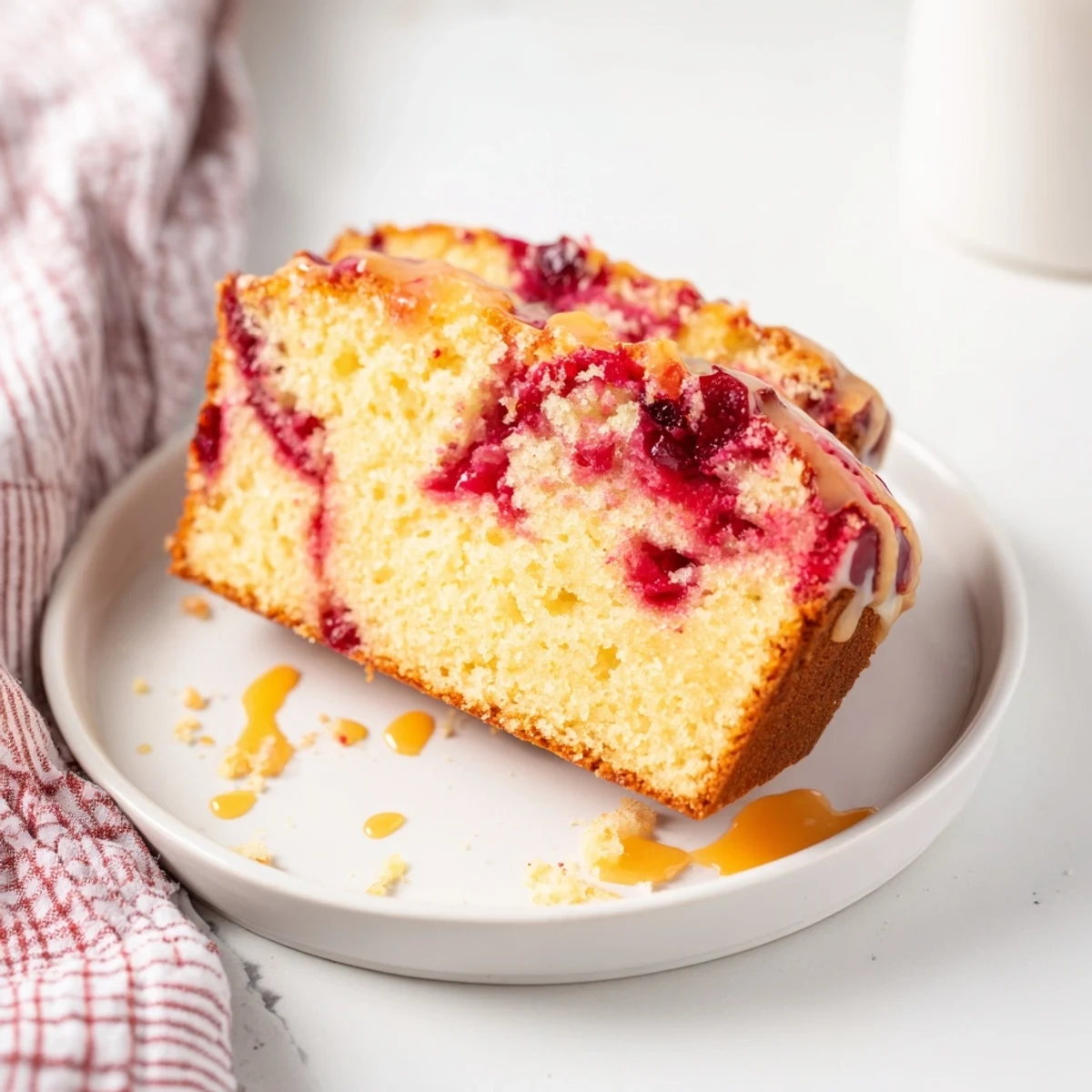 Freshly baked New Year Celebration Cranberry Swirl Cake, swirled with stunning cranberry patterns.