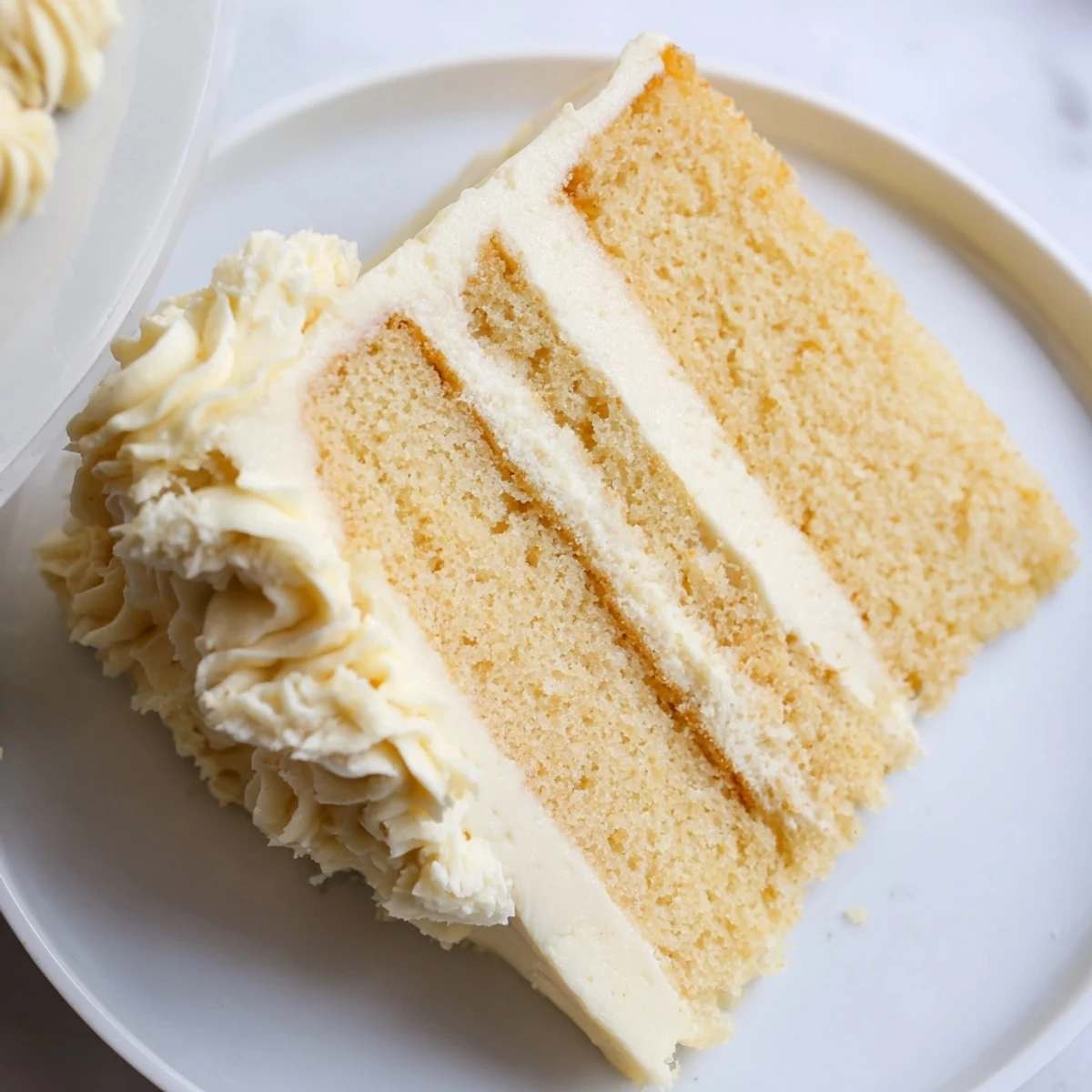 This gluten-free Frosted Delight Vanilla Cloud cake has a perfect balance of flavor and texture.