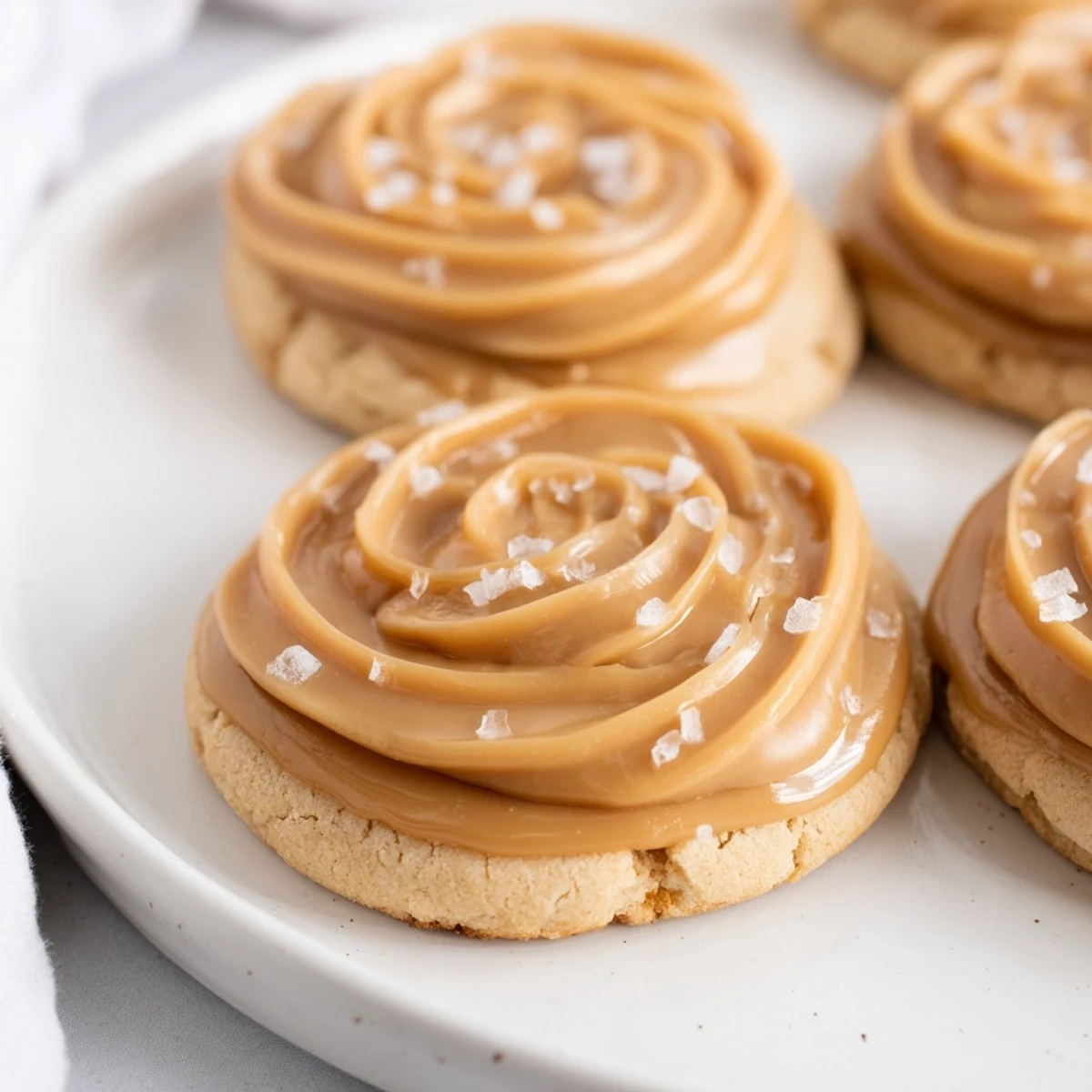 Delectable Frosted Delight Caramel Frost Keto Cookies, beautifully frosted, perfect for a guilt-free dessert.