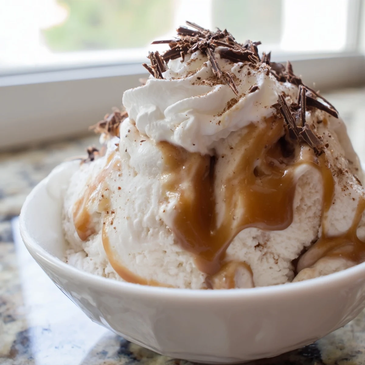 A bowl of Snowy Day Caramel Frost topped with whipped cream, set against a cozy winter backdrop.