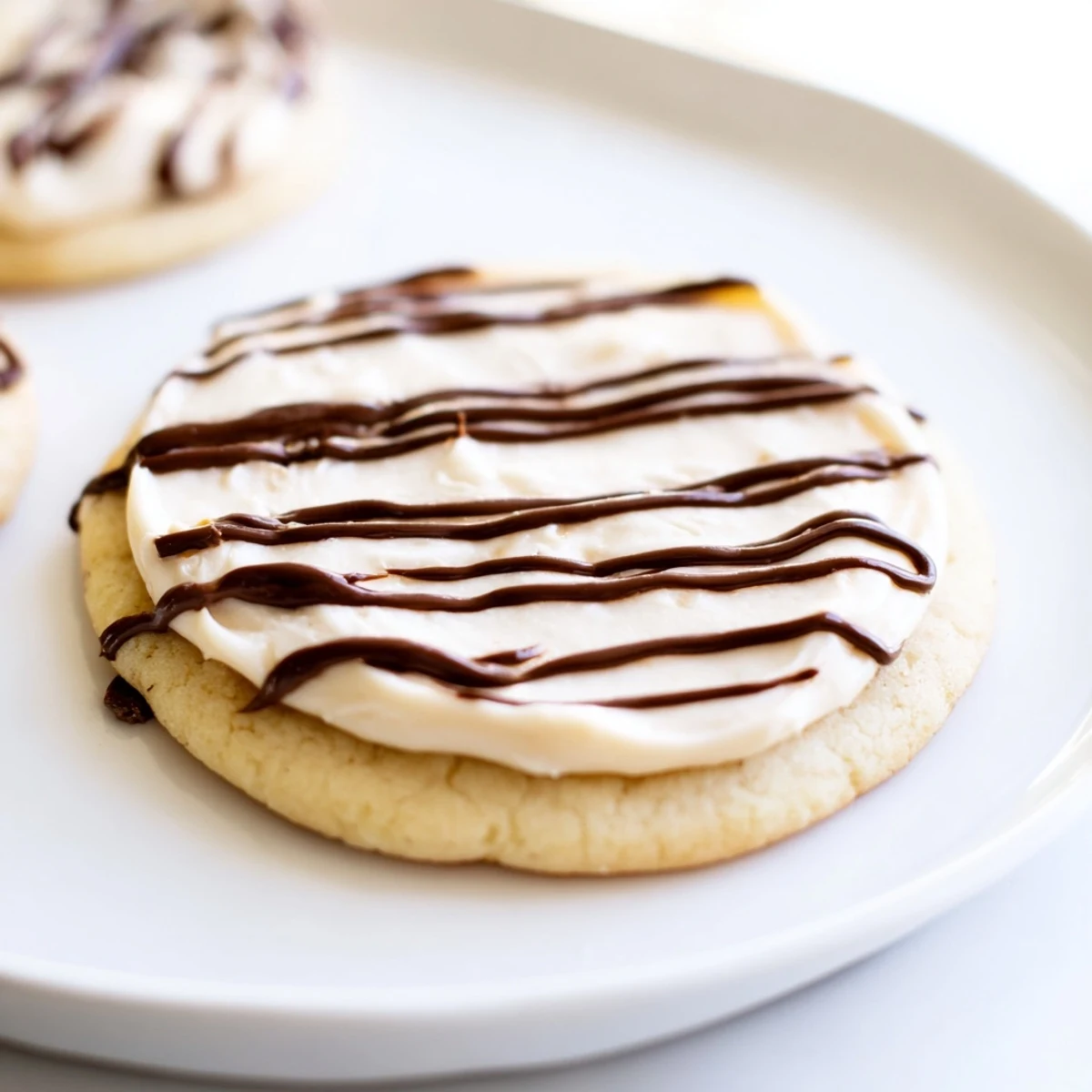 Frosted delight hazelnut drizzle sugar cookies, freshly baked and decorated, shown on a cooling rack ready to be served for festive occasions.