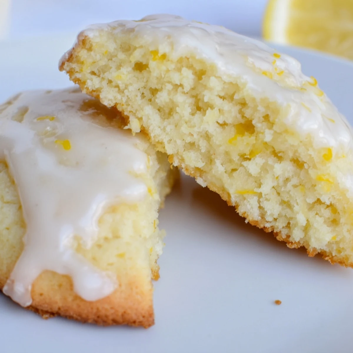 Cake-like gluten-free lemon ricotta style cookies with creamy texture finished with bright lemon icing drizzle.