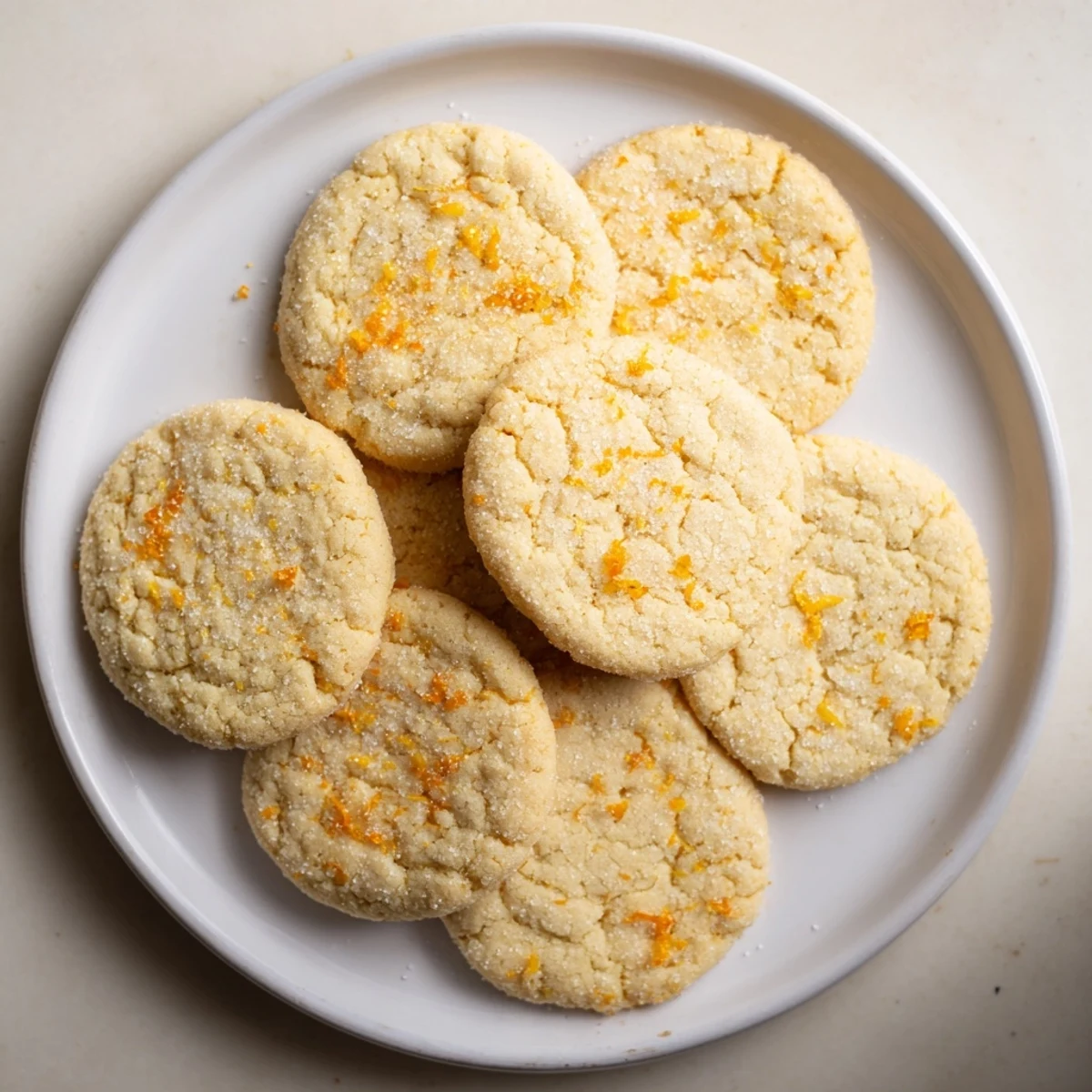 Plant-based citrus sugar cookies infused with bright tangerine zest and aromatic vanilla flecks