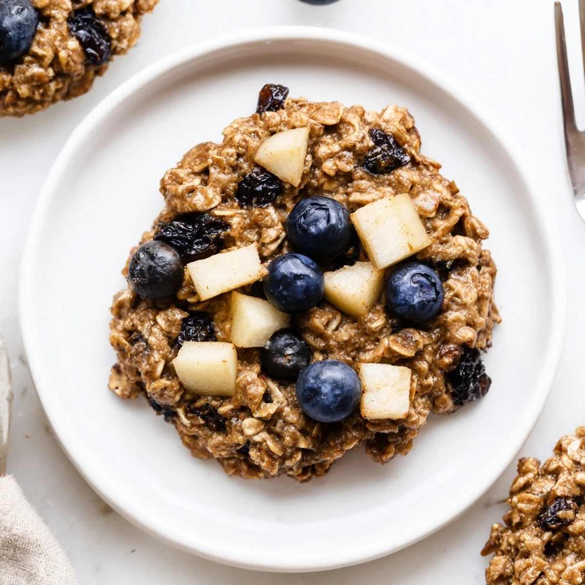 Chewy Vegan Blueberry Apple Oatmeal Raisin Cookies with cinnamon and apples